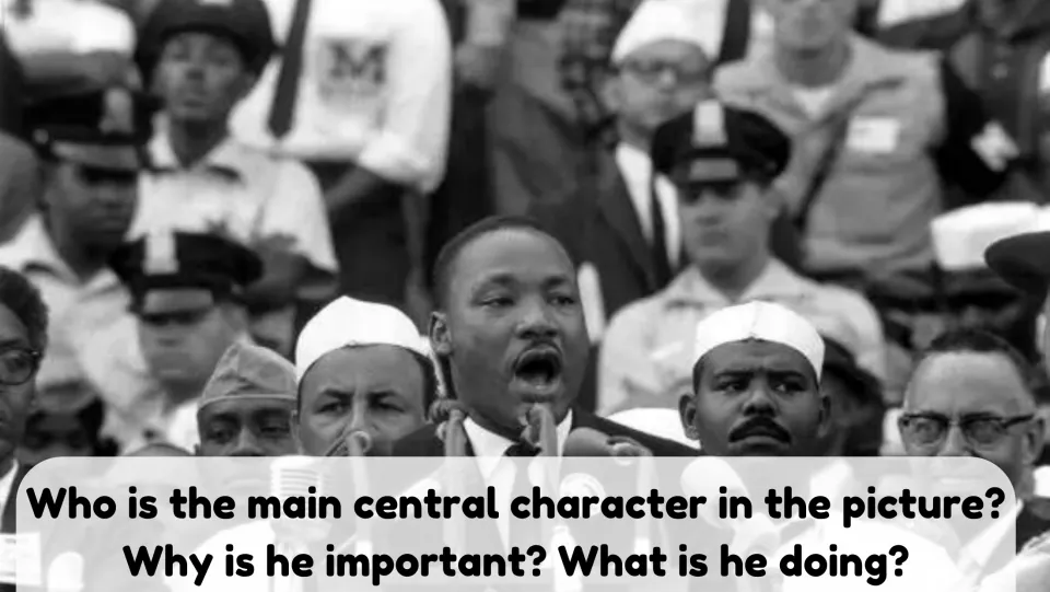 Picture description: a man speaks at microphones before a crowd; students say who he is, why he matters, what he's doing