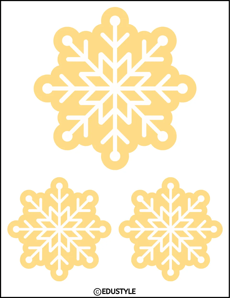 Winter decoration: three pale yellow snowflakes, one large and two small, to cut out and scatter across the door display