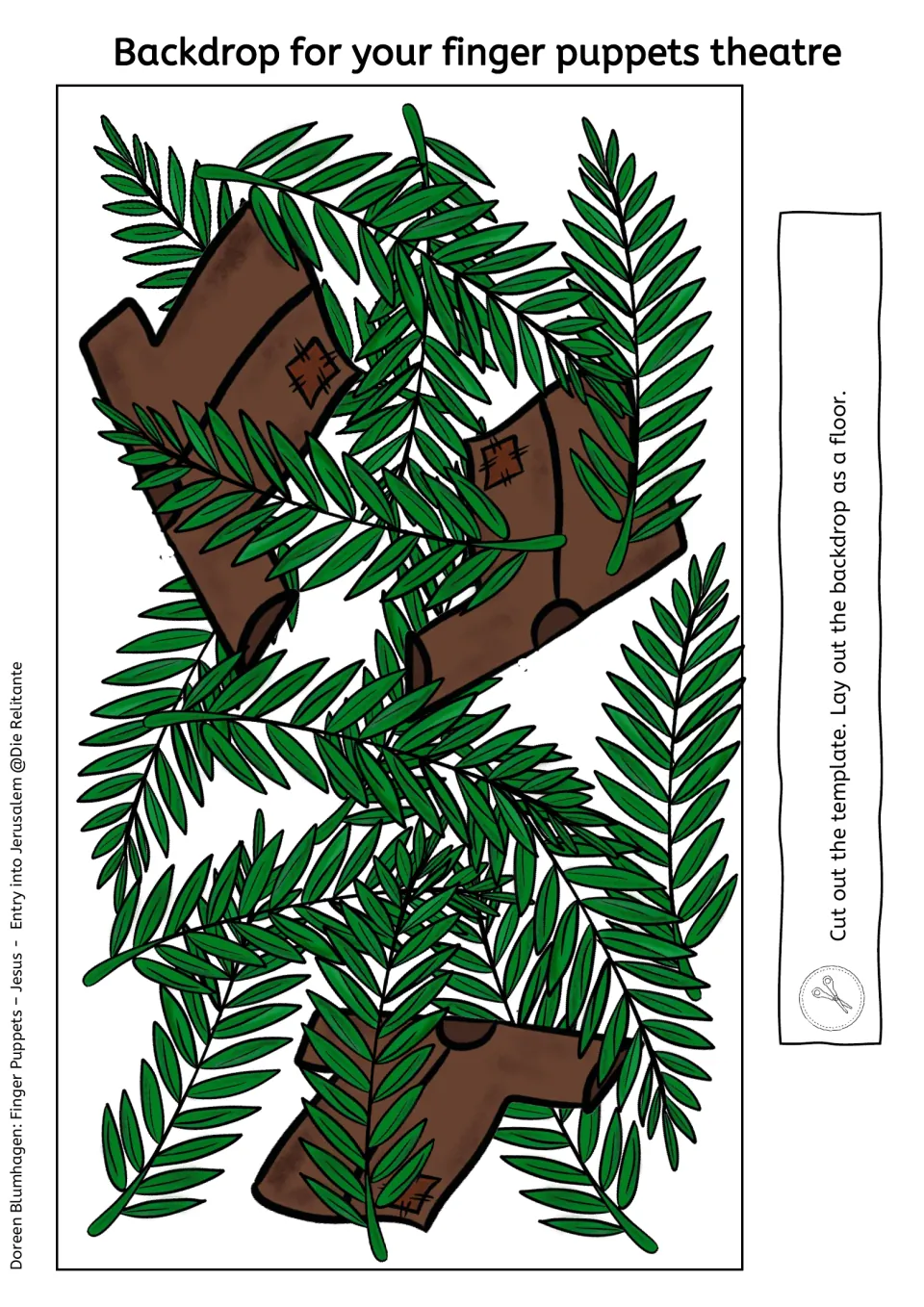 Floor backdrop of cloaks and palm branches spread on the ground; students cut it out and lay it flat under the puppets