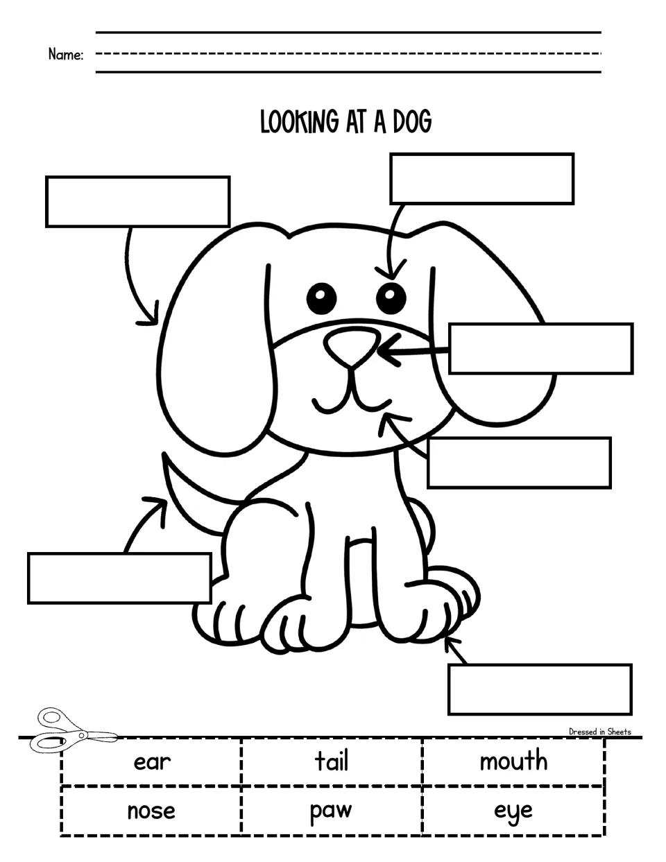 Dog body parts: students cut out ear, tail, mouth, nose, paw and eye and glue each label beside a sitting puppy