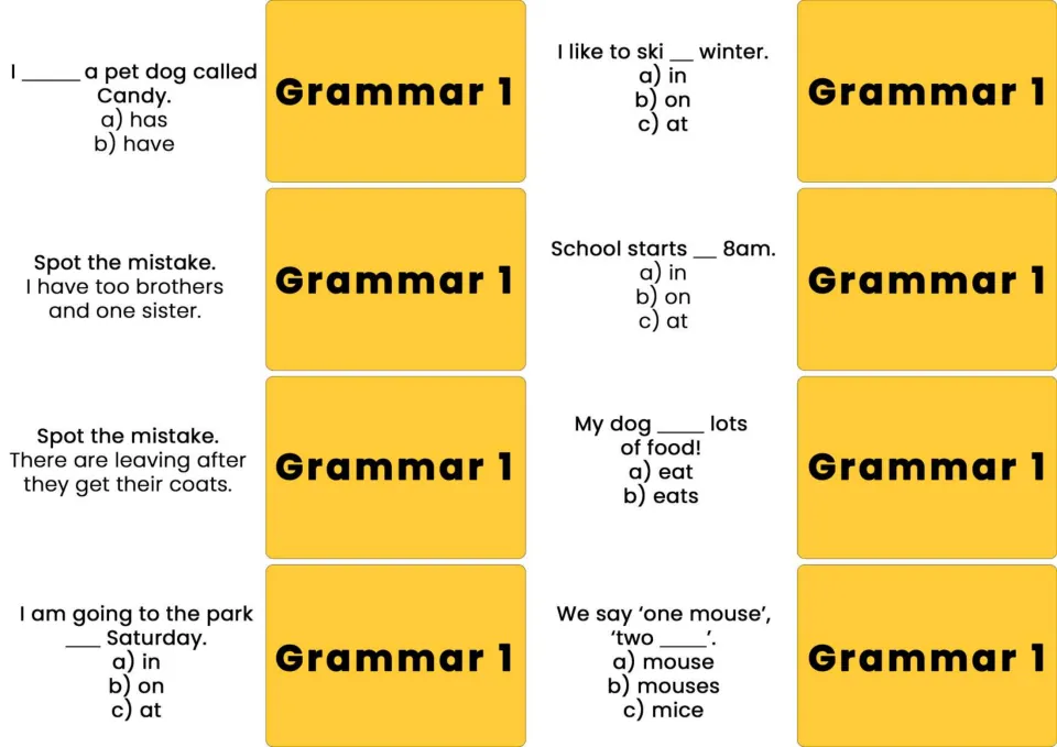 Eight Grammar 1 cards cover has/have, too/two, there/they, time prepositions, eat/eats, and mouse plurals.
