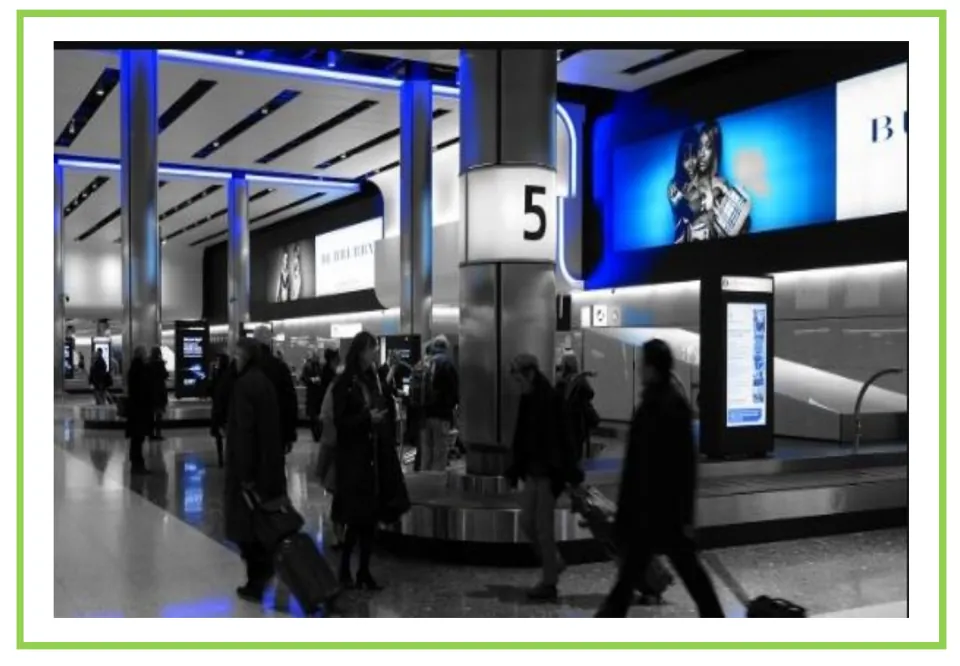 Airport vocabulary flashcard without a label, showing travelers beside a baggage carousel marked with the number 5