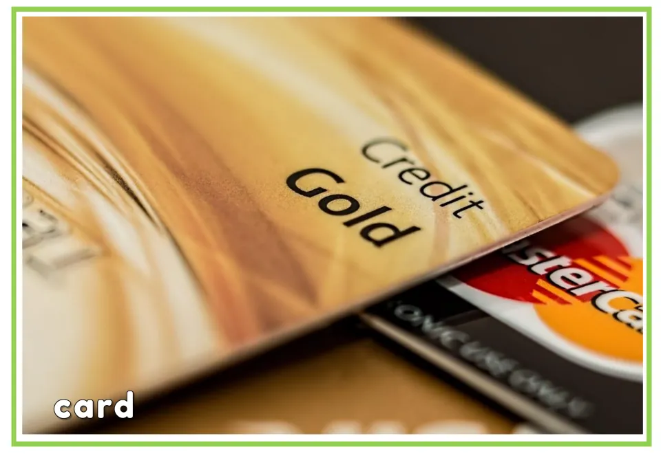 Labeled banking vocabulary flashcard showing overlapping gold and other credit cards, with the word "card"