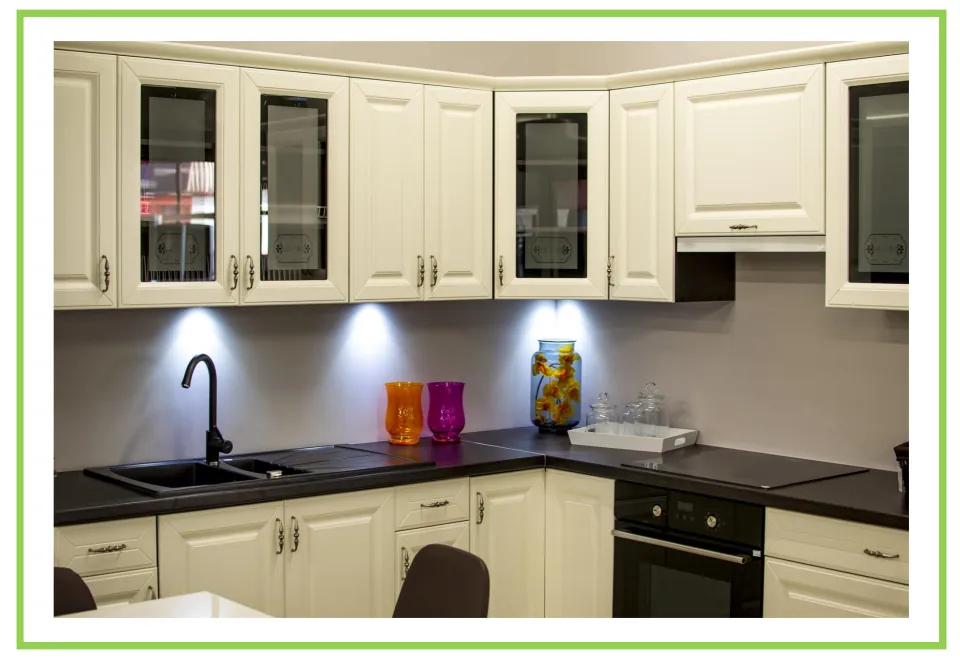 Picture-only furniture vocabulary flashcard showing kitchen cupboards above and below a dark countertop