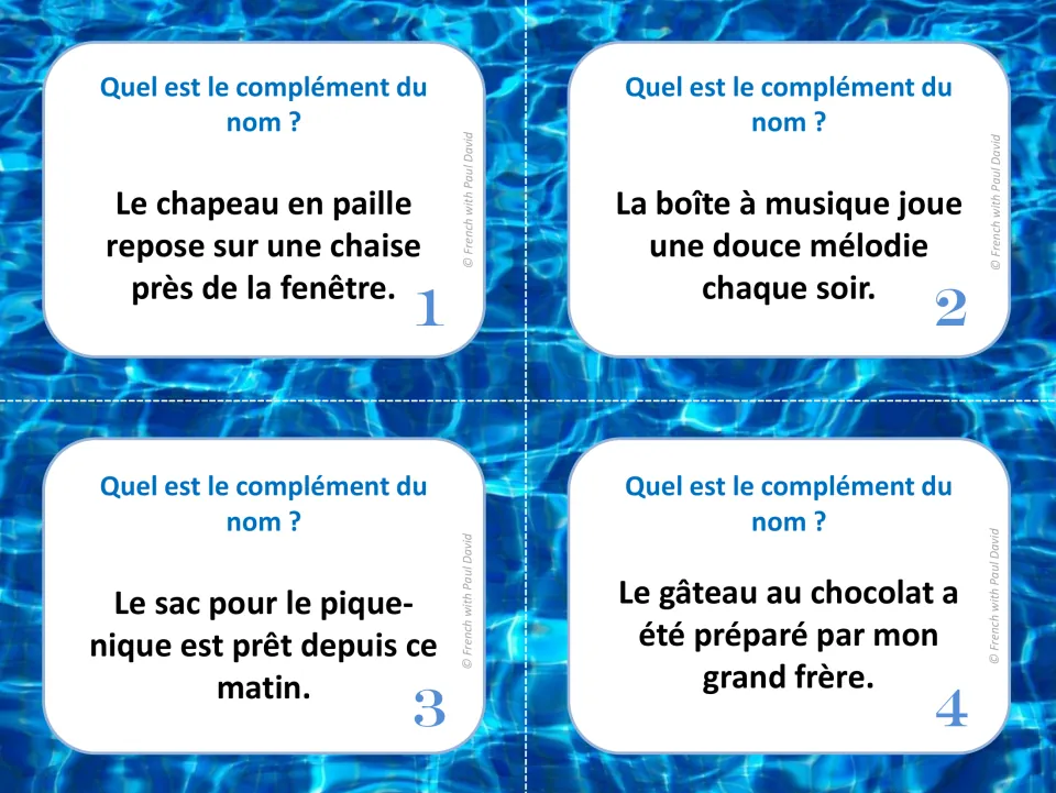 French noun complement task cards 1–4: sentences about a straw hat, music box, picnic bag, and chocolate cake