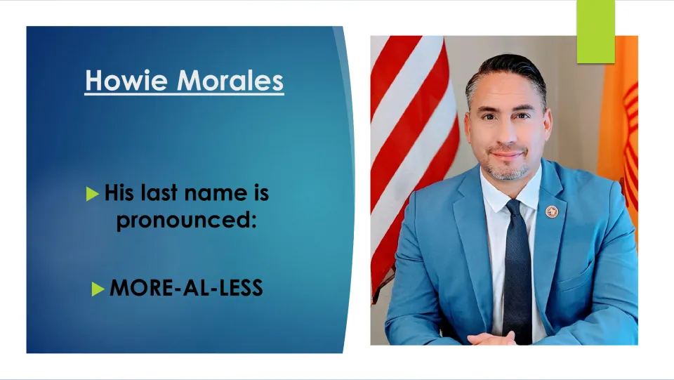 Biography slide giving the pronunciation of Howie Morales’s last name as “MORE-AL-LESS,” beside his portrait