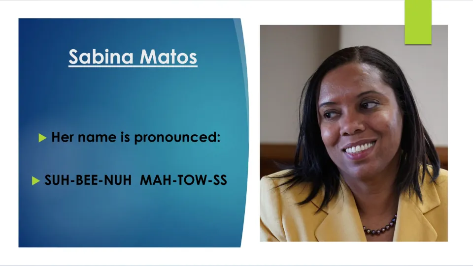 Biography slide giving the pronunciation of Sabina Matos’s name as “SUH-BEE-NUH MAH-TOW-SS,” with her portrait