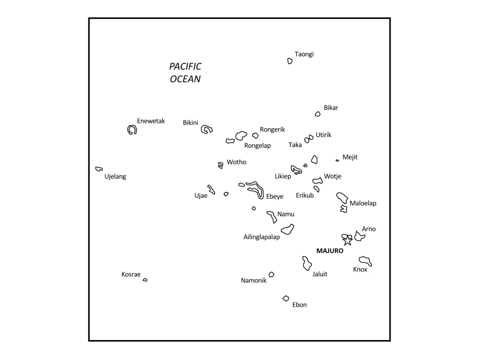 Labeled Marshall Islands map naming atolls such as Majuro, the starred capital, Bikini, Enewetak and Jaluit