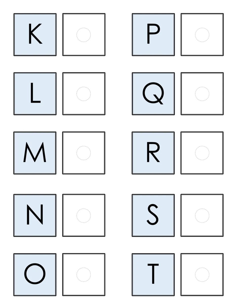 Letter matching mat K to T: students set a matching letter card in the empty space next to each capital letter shown