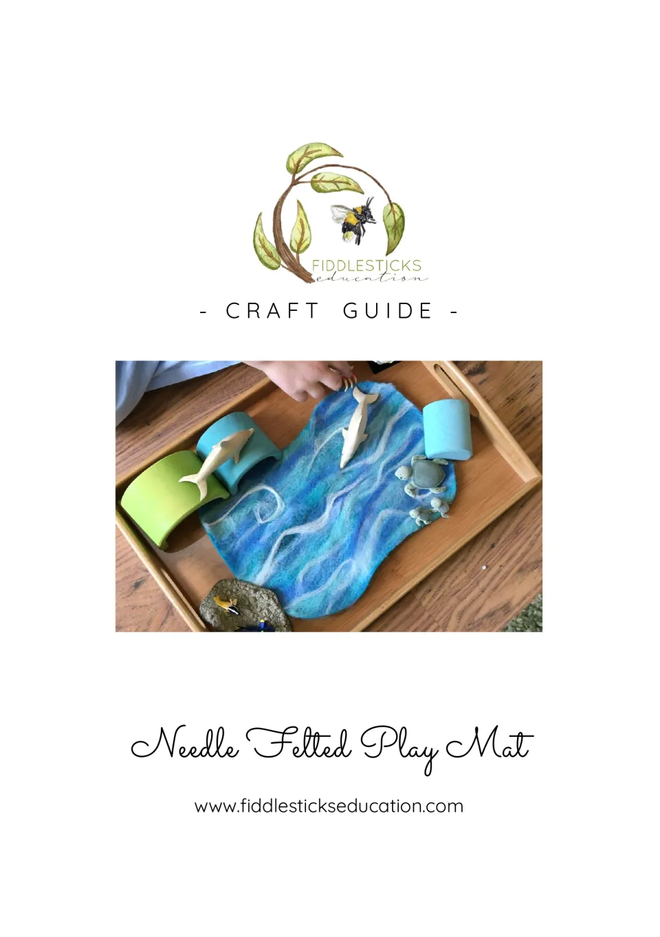 Needle Felted Play Mat craft guide cover showing a blue felted ocean mat on a tray with dolphins, turtles and arches
