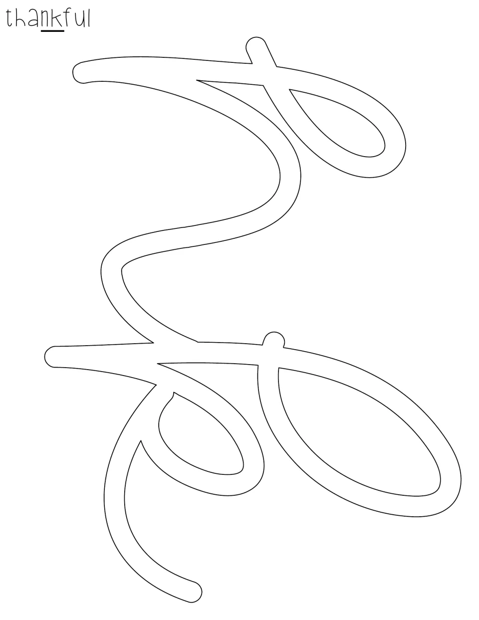 Cut-out piece showing the middle cursive letters n and k of 'thankful' as one sideways outline for the display