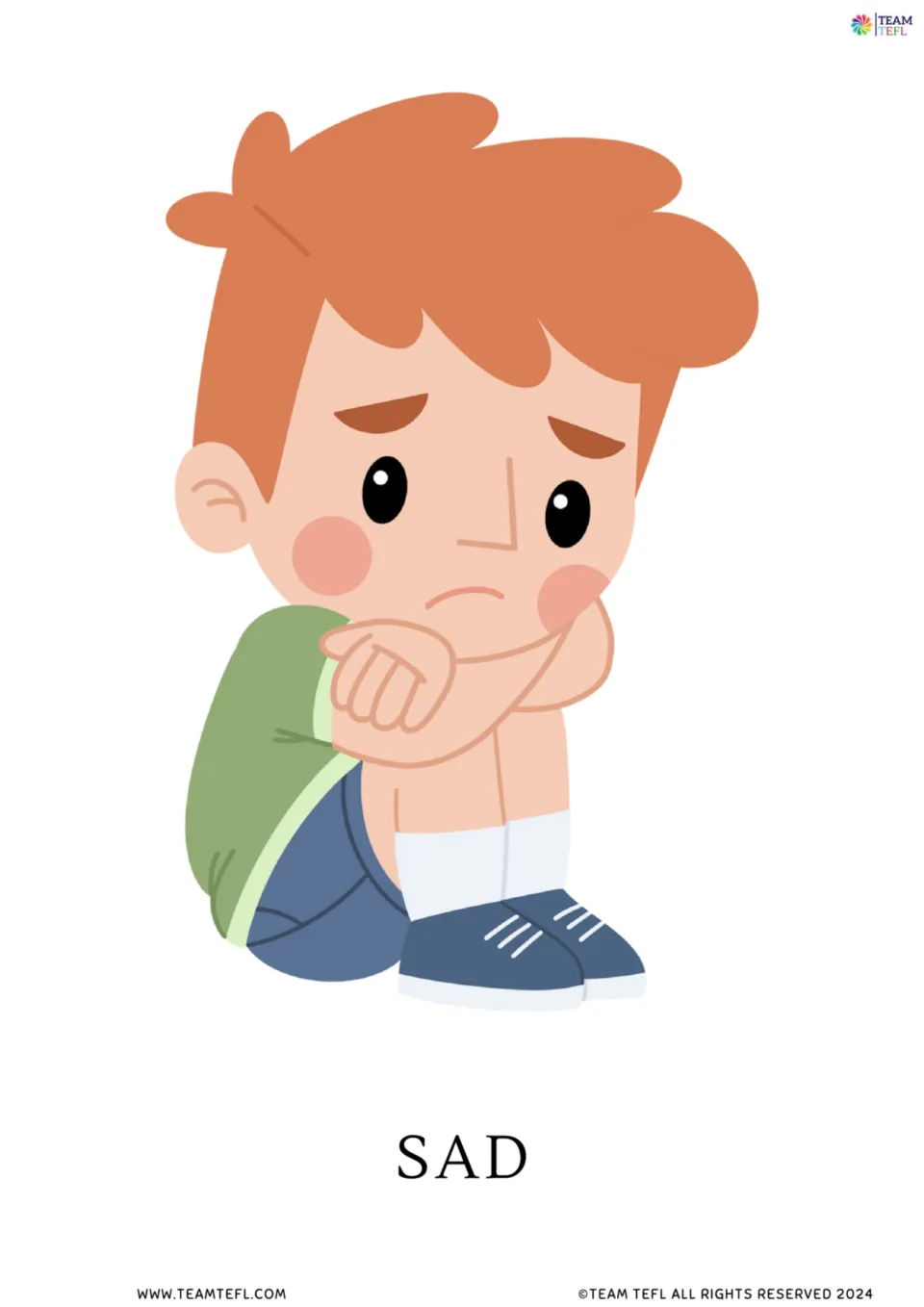Full-page sad flashcard from the feelings vocabulary set, showing a frowning child hugging his knees