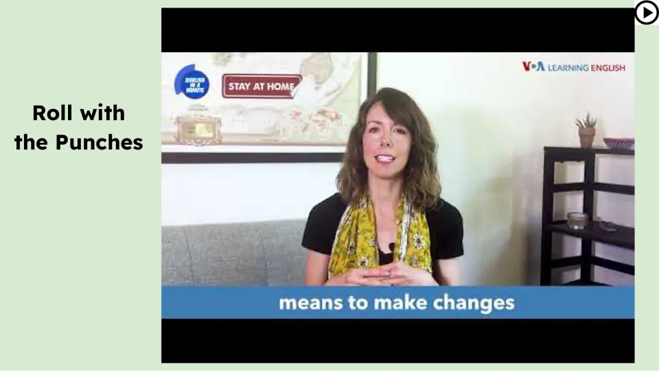 Video lesson slide shows a VOA Learning English presenter and the explanation 'means to make changes'