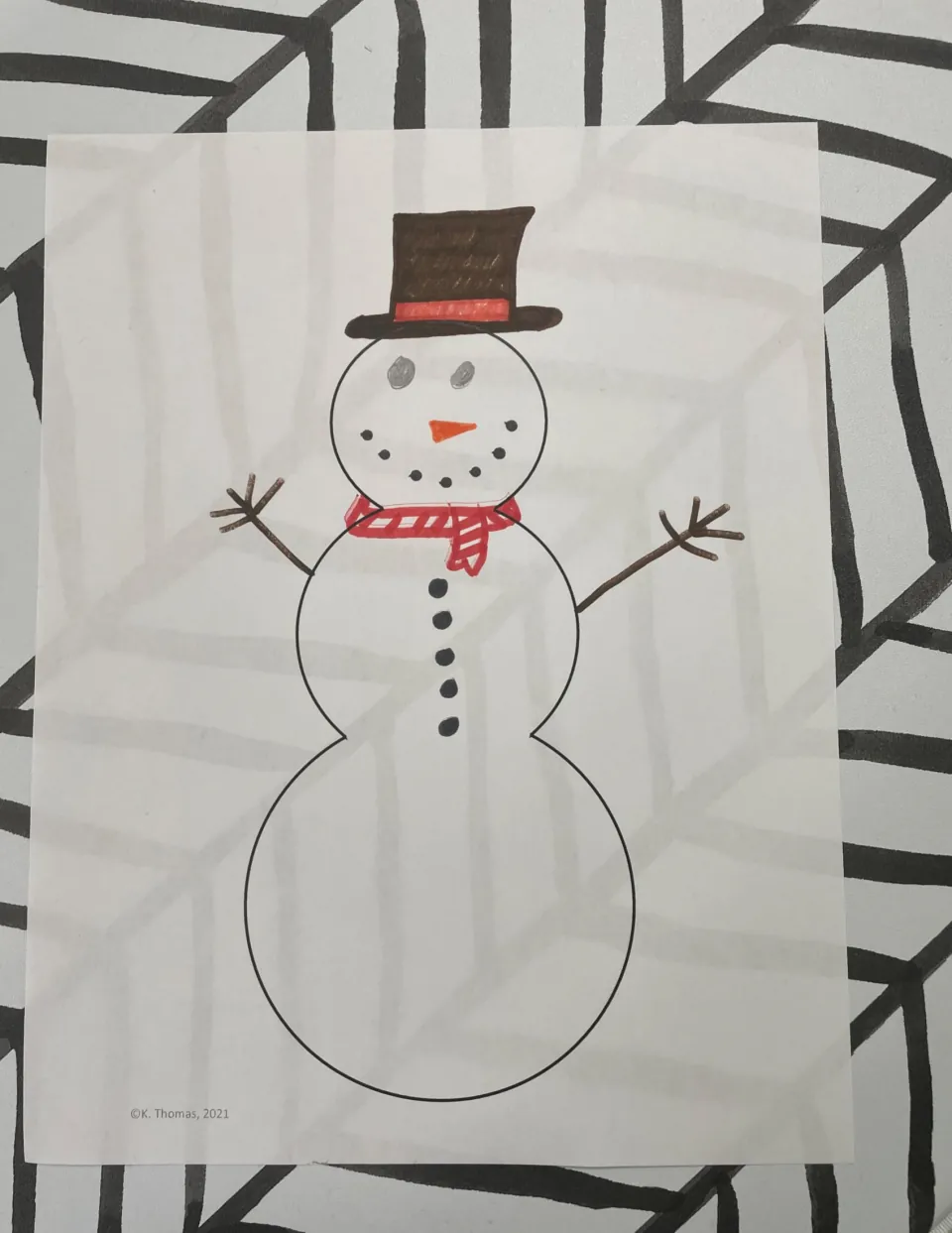 Completed example snowman drawing: brown top hat with red band, striped red scarf, carrot nose, gray eyes and five buttons