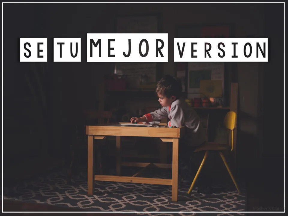 Phrase 'Sé tu mejor versión' above a photo of a young boy working alone at a small wooden table in a dim room