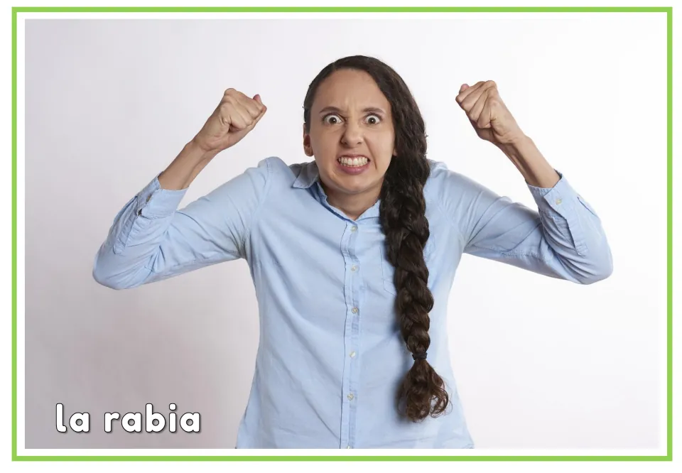 Spanish emotions flashcard labeled “la rabia” (anger), showing a woman with raised fists and bared teeth