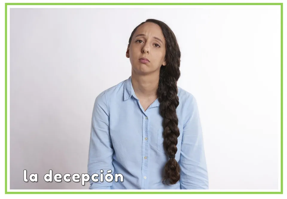 Spanish emotions flashcard labeled “la decepción” (disappointment), showing a woman with a downturned mouth