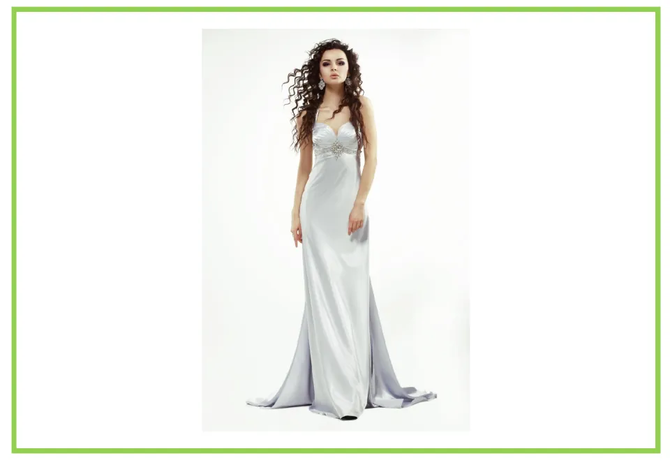 Clothing picture card with no label: woman in a long silver satin gown, for students to identify the item in Spanish