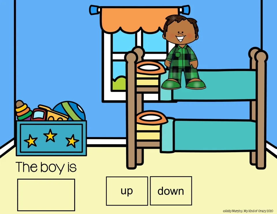 Spatial concepts slide: 'The boy is' with up/down choices and a boy sitting on the top bunk of a bunk bed.