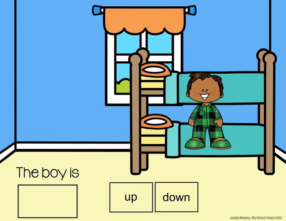 Spatial concepts slide: 'The boy is' with up/down choices and a boy sitting on the bottom bunk of a bunk bed.