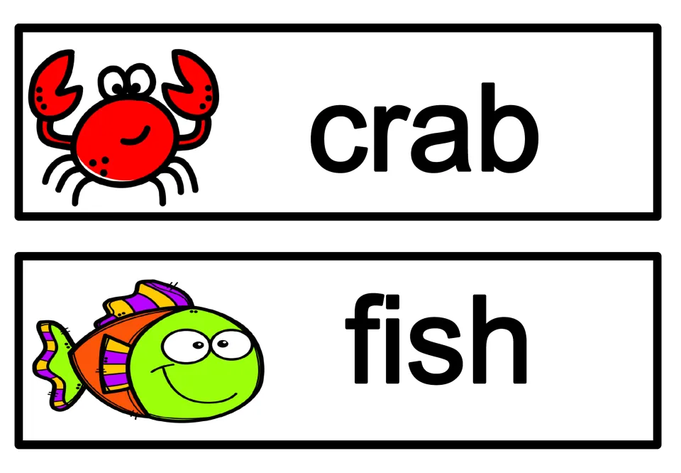 Sea animal word cards: 'crab' with a smiling red crab and 'fish' with a colorful striped fish