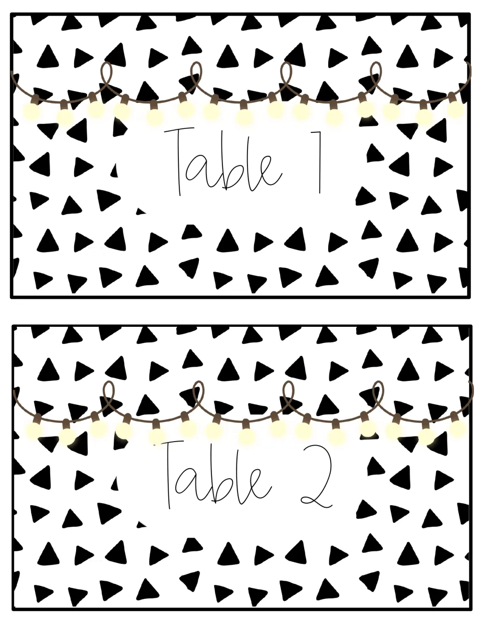 Table number signs 1 and 2 in a black-and-white version: script labels under glowing string lights on scattered triangles