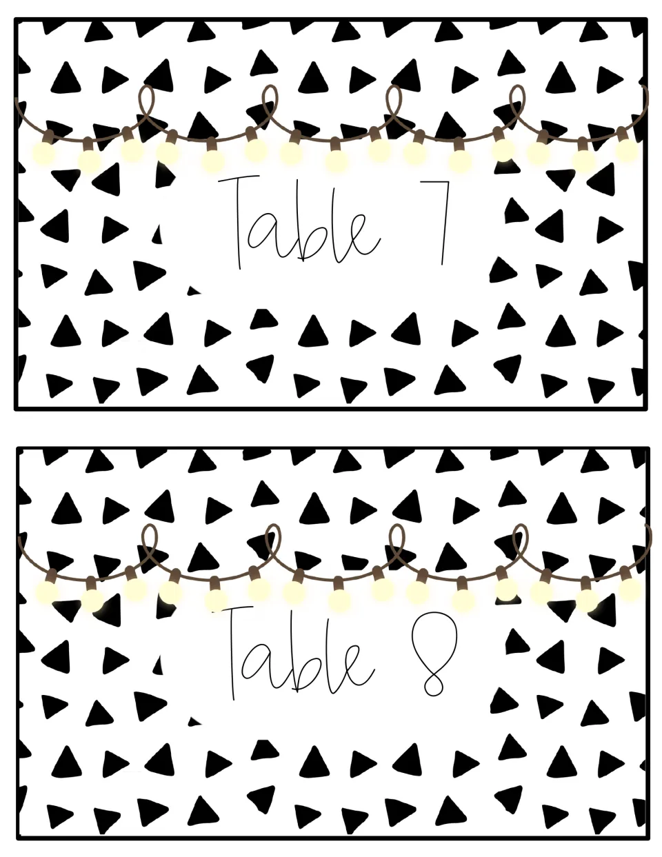 Table number signs 7 and 8: black triangle pattern with a looping strand of lights hung above each handwritten label