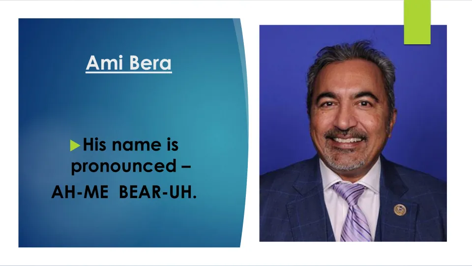 Biography slide giving the pronunciation of Ami Bera’s name as “AH-ME BEAR-UH,” alongside his portrait