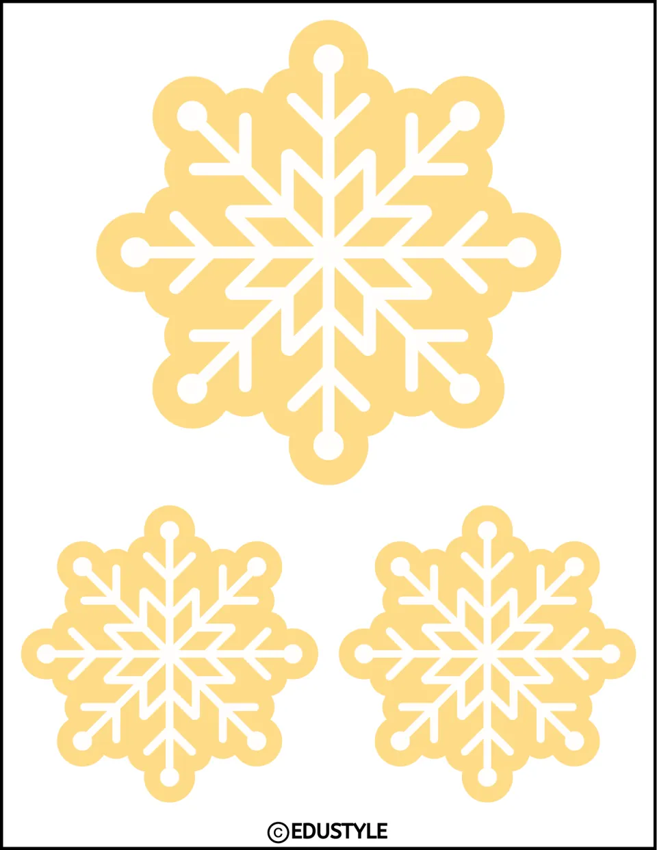 Three pastel yellow snowflake cutouts, one larger and two smaller, for the winter bulletin board or door