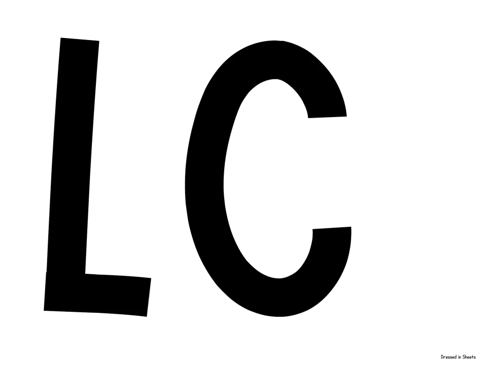 Cut-out piece for the welcome banner: large black capital letters L and C, the middle of the word WELCOME