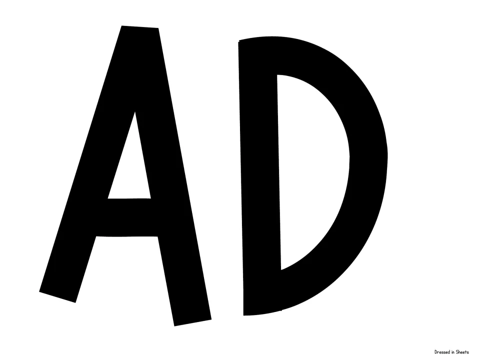 Cut-out piece for the welcome banner: large black capital letters A and D, the middle letters of the word GRADE