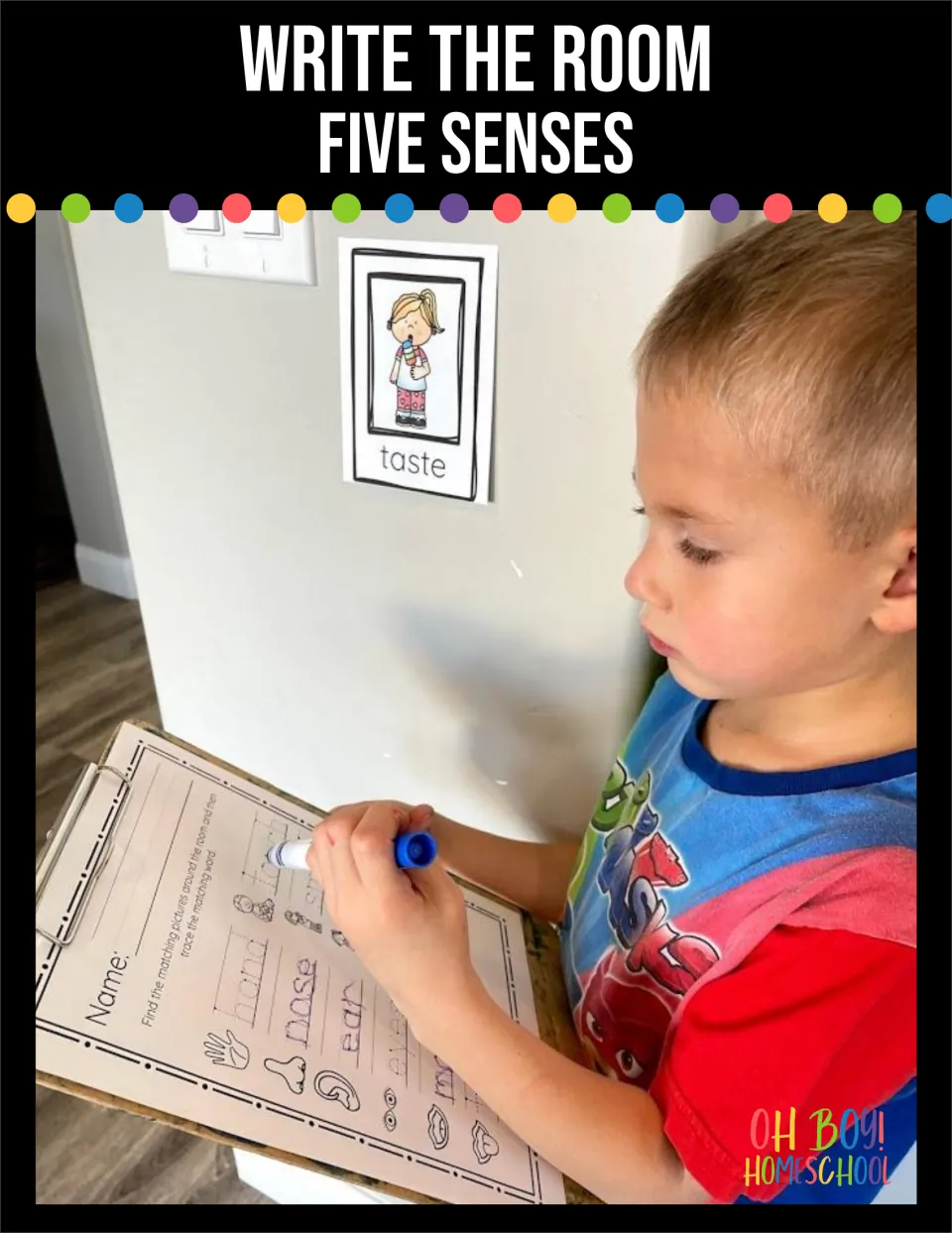 Write the Room Five Senses cover: a boy traces sense words on a clipboard sheet beside a taste picture card taped to a wall