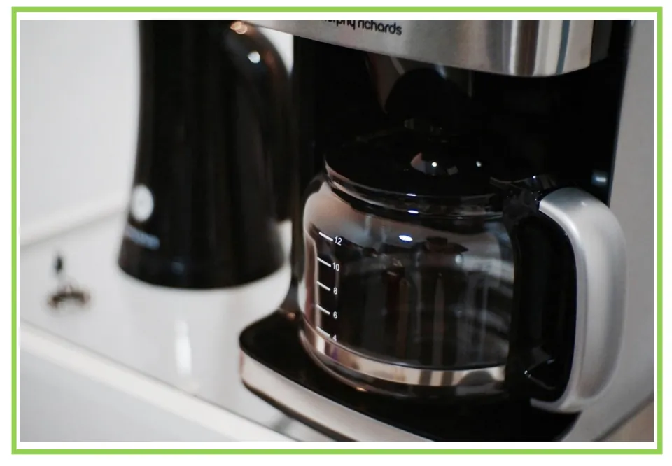 Appliance discussion and writing prompt card 9: a drip coffee maker with a glass carafe beside a kettle