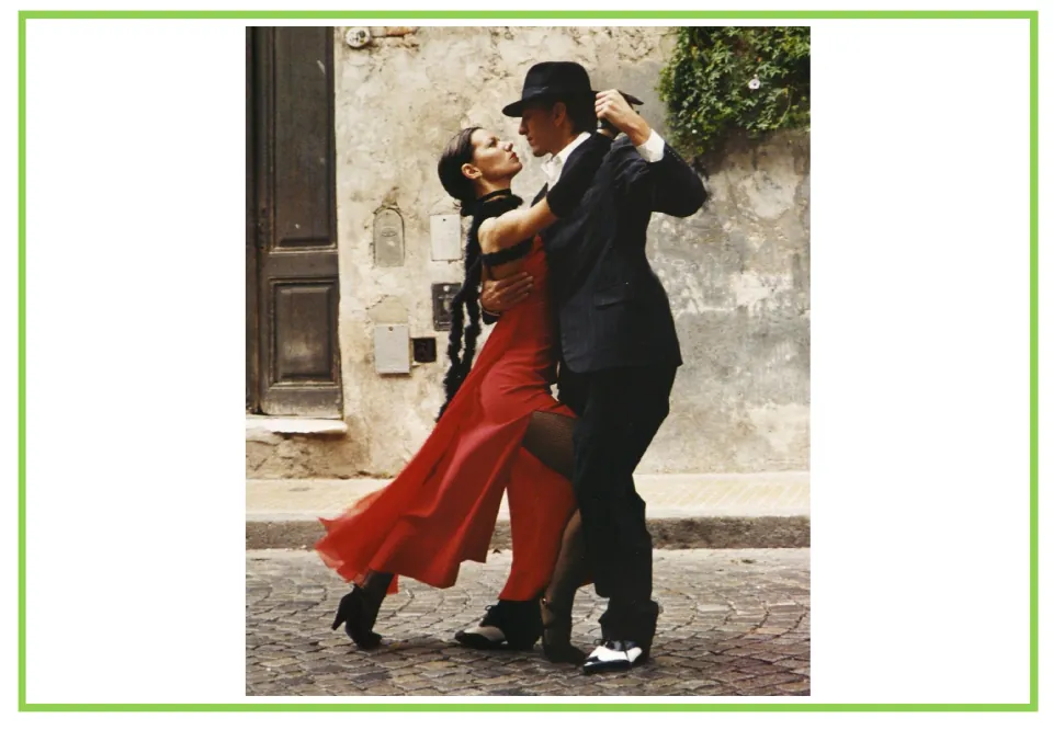 Hobbies writing and discussion prompt card showing a couple dancing together on a cobblestone street