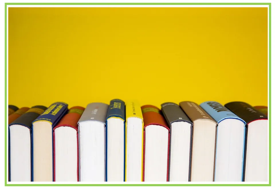 Hobbies writing and discussion prompt card showing a row of hardcover books against a yellow background