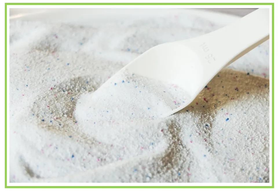 Hygiene discussion and writing prompt card 9 shows powdered laundry detergent with a white measuring scoop.