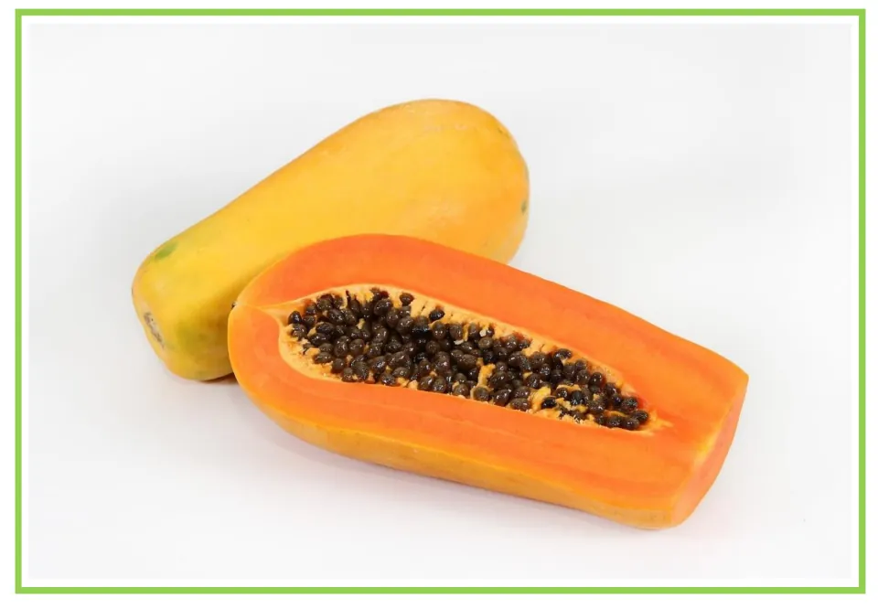 Fruit flashcard 10 for writing prompts and discussion: a whole papaya and a half with orange flesh and black seeds