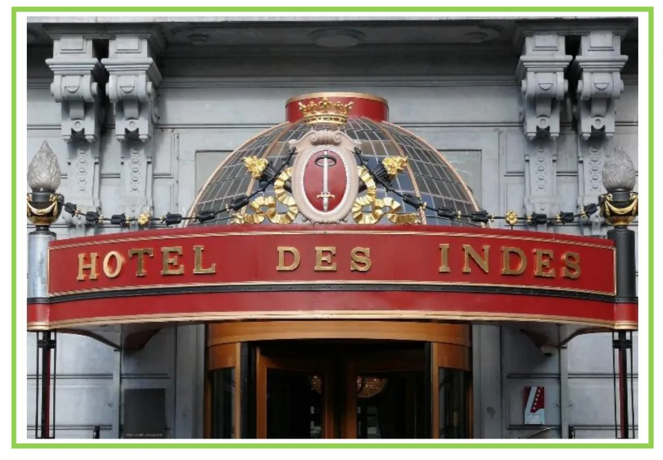 Building discussion and writing prompt card 10: a hotel entrance beneath a red and gold Hotel Des Indes sign