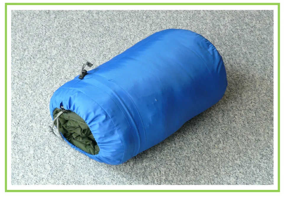 Camping writing and discussion prompt card 2: a sleeping bag packed inside a blue drawstring stuff sack