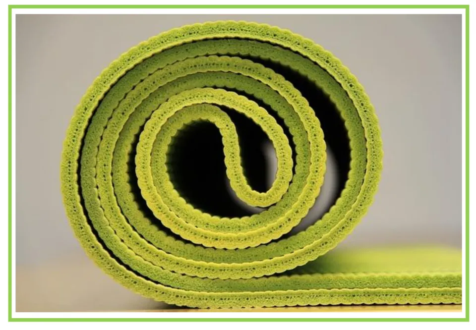Camping writing and discussion prompt card 3: a green foam sleeping mat rolled up with one end extended