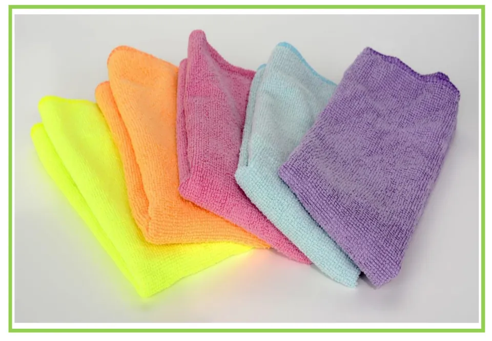 Cleaning discussion flashcard showing five folded cloths in yellow, orange, pink, light blue, and purple