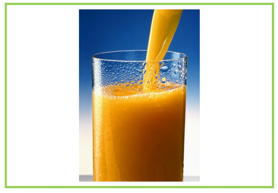 Coffee shop writing and discussion cue card 3: orange juice being poured into a tall drinking glass