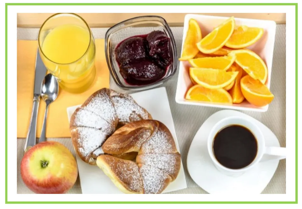Meals and diet discussion flashcard 3: breakfast pastries, orange slices, juice, coffee, and an apple