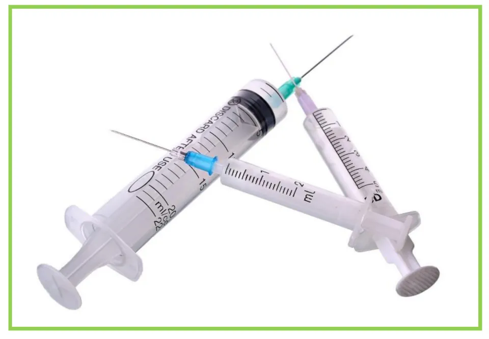 Medical center writing and discussion flashcard 9 shows three syringes with needles and measurement marks.
