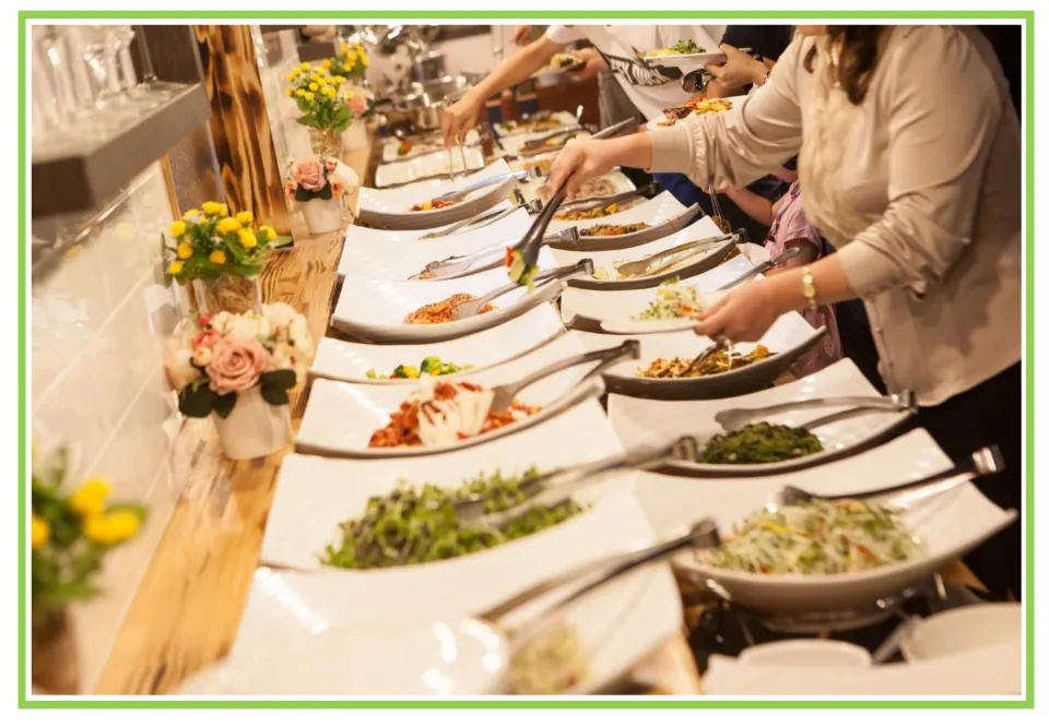 Party writing and discussion flashcard 6: people use serving utensils to fill their plates at a buffet