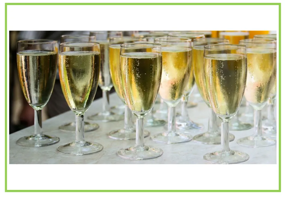 Party writing and discussion flashcard 7: a collection of stemmed glasses filled with a bubbly golden drink