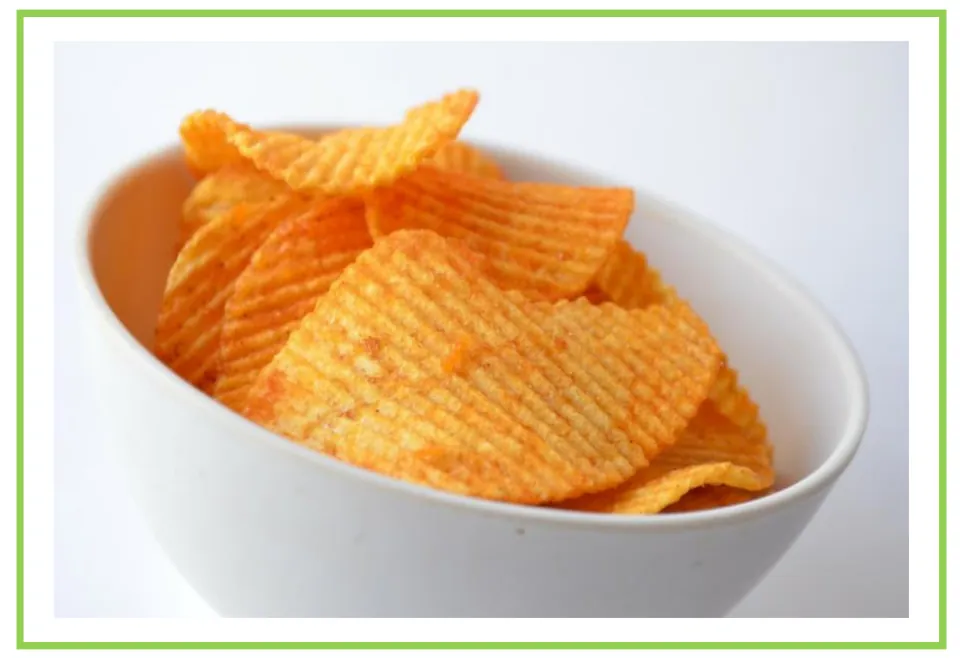 Salty snack flashcard 1 for writing prompts and discussions shows ridged potato chips in a white bowl.