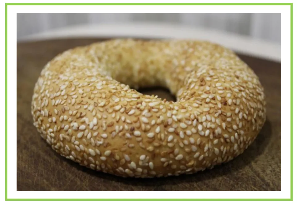 Salty snack flashcard 4 for writing prompts and discussions shows a bagel covered with sesame seeds.
