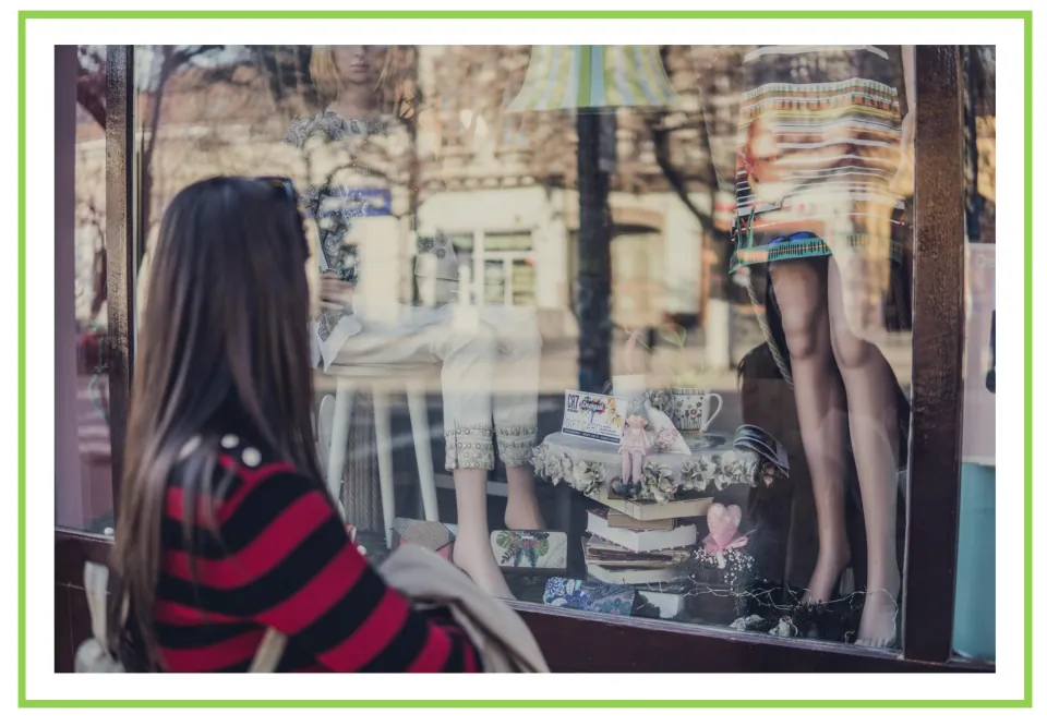 Shopping discussion and writing prompt card 2: a shopper looking at clothing in a store window display