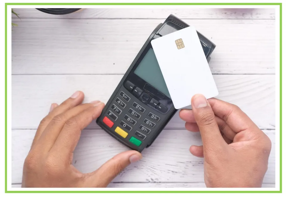 Shopping discussion and writing prompt card 6: hands holding a chip payment card above a card terminal